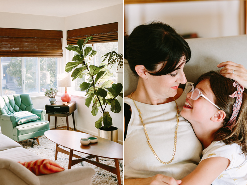 mother-gazes-at-daughter-in-mid-century-modern-decor-room